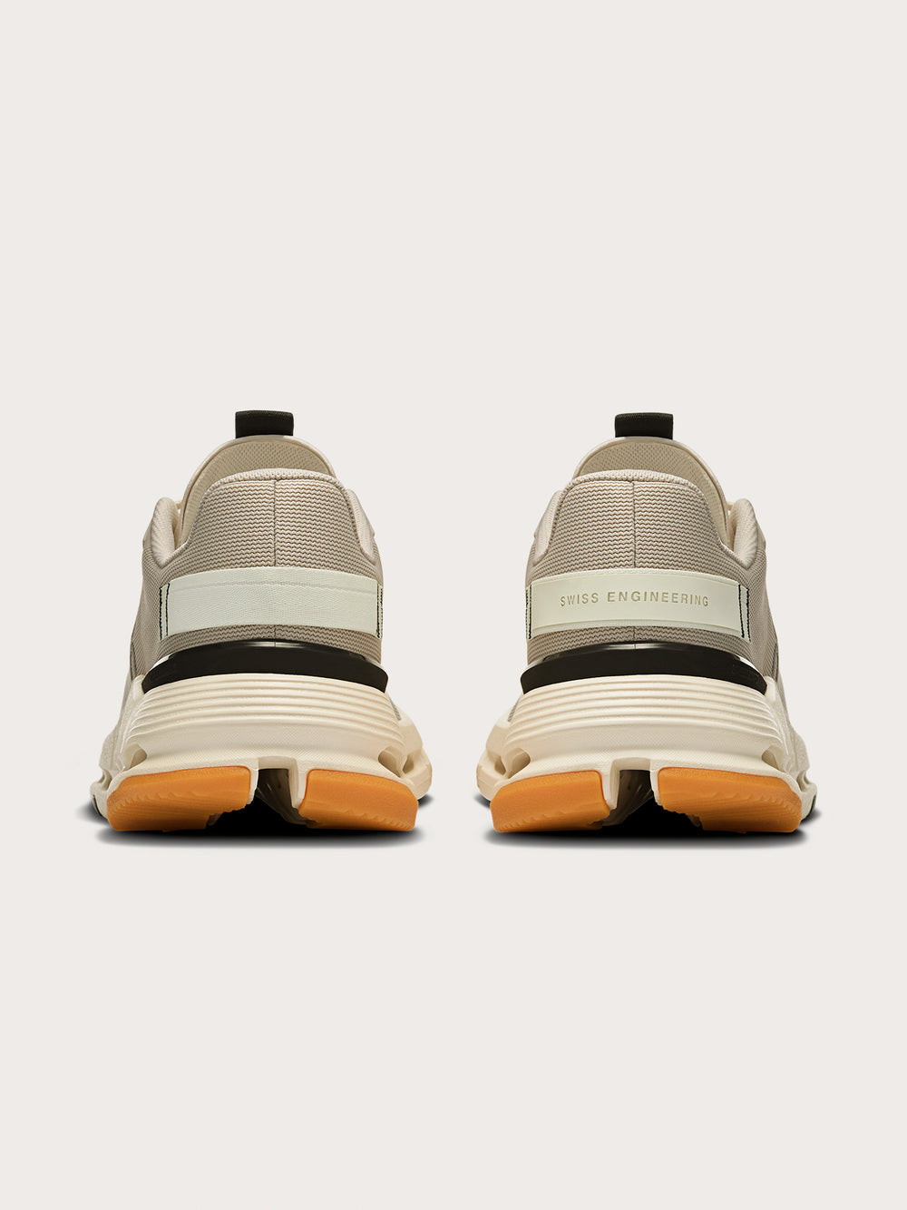 Truffle Dew-colored athletic sneakers.