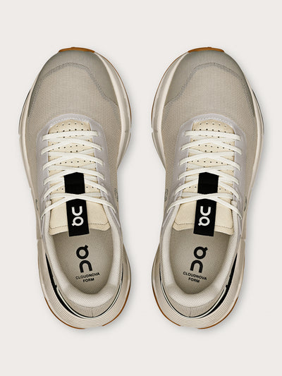 Truffle Dew-colored athletic sneakers.