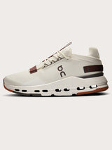 Mulberry-colored athletic sneakers.