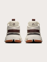 Mulberry-colored athletic sneakers.