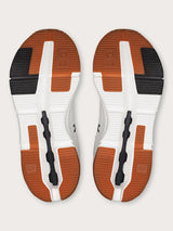 Mulberry-colored athletic sneakers.