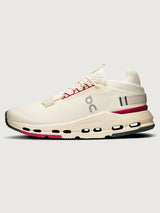 On Cloudnova 2 women’s sneakers in Ivory Grenadine, showing medial side with CloudTec® cushioning, mesh upper, and contrast sole, side view.