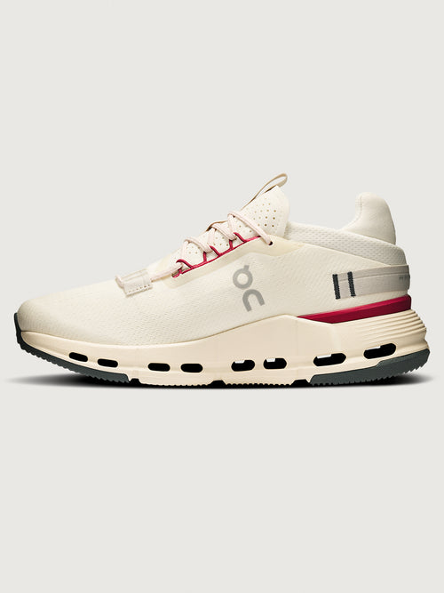 On Cloudnova 2 women’s sneakers in Ivory Grenadine, showing medial side with CloudTec® cushioning, mesh upper, and contrast sole, side view.