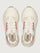 On Cloudnova 2 women’s sneakers in Ivory Grenadine, top-down view highlighting lace-up front, perforated tongue, and cushioned interior with branded insole.