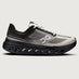 Black and gray athletic shoe with 'Swiss Engineering' text on a light gray background