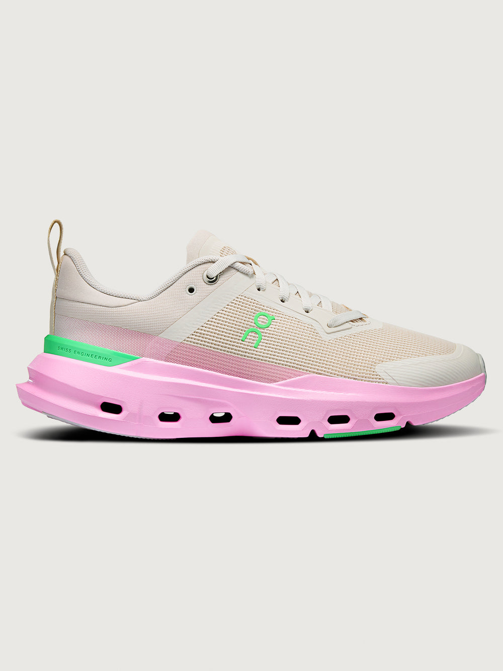 Sneaker with a pink sole on a white background