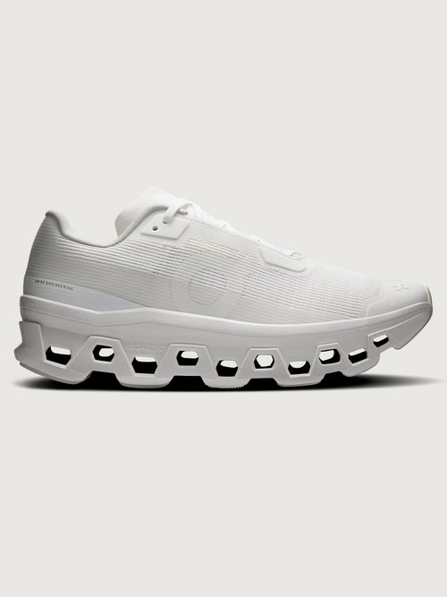 Cloudmonster Void sneaker in white white lateral side view with engineered mesh upper and CloudTec sole.