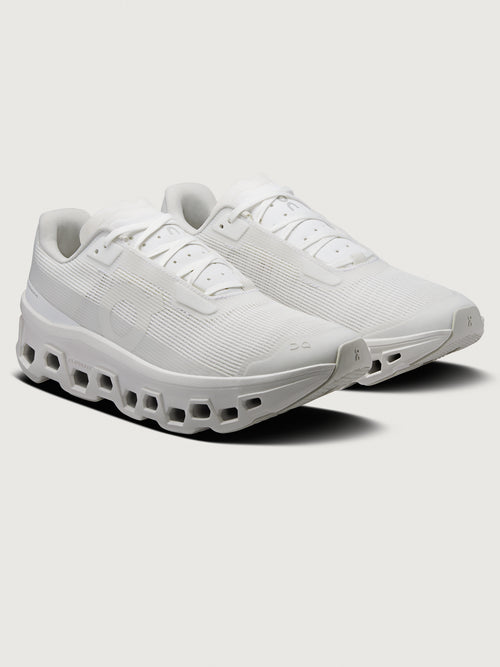 Cloudmonster Void sneaker in white white angled front view with lace up closure and cushioned CloudTec midsole.