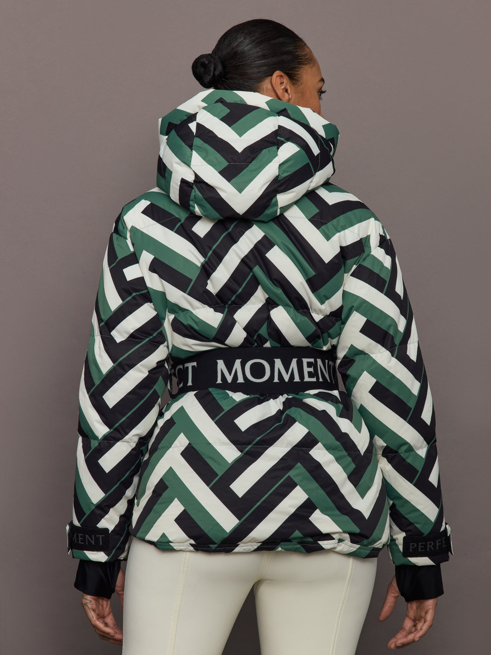 Back view of Cortina Ski Parka Waffle Print Green with bold geometric pattern and Perfect Moment logo belt.
