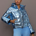 Front view of model wearing Polar Flare Ski Jacket III Light Blue Foil.