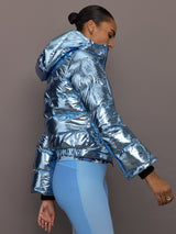 Side profile of Polar Flare Ski Jacket III Light Blue Foil showing metallic shine and hood.
