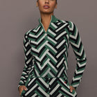 Front view of model wearing LA Tour Merino Wool Quarter Zip Sweater in green waffle print.