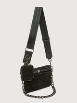 Black textured handbag with a chain detail on a light gray background