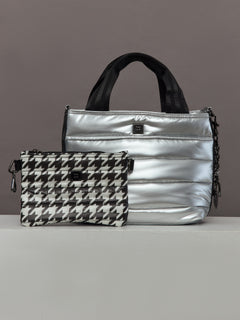 Front view of Travel Escape Bag in Pearl Silver with matching houndstooth pouch.