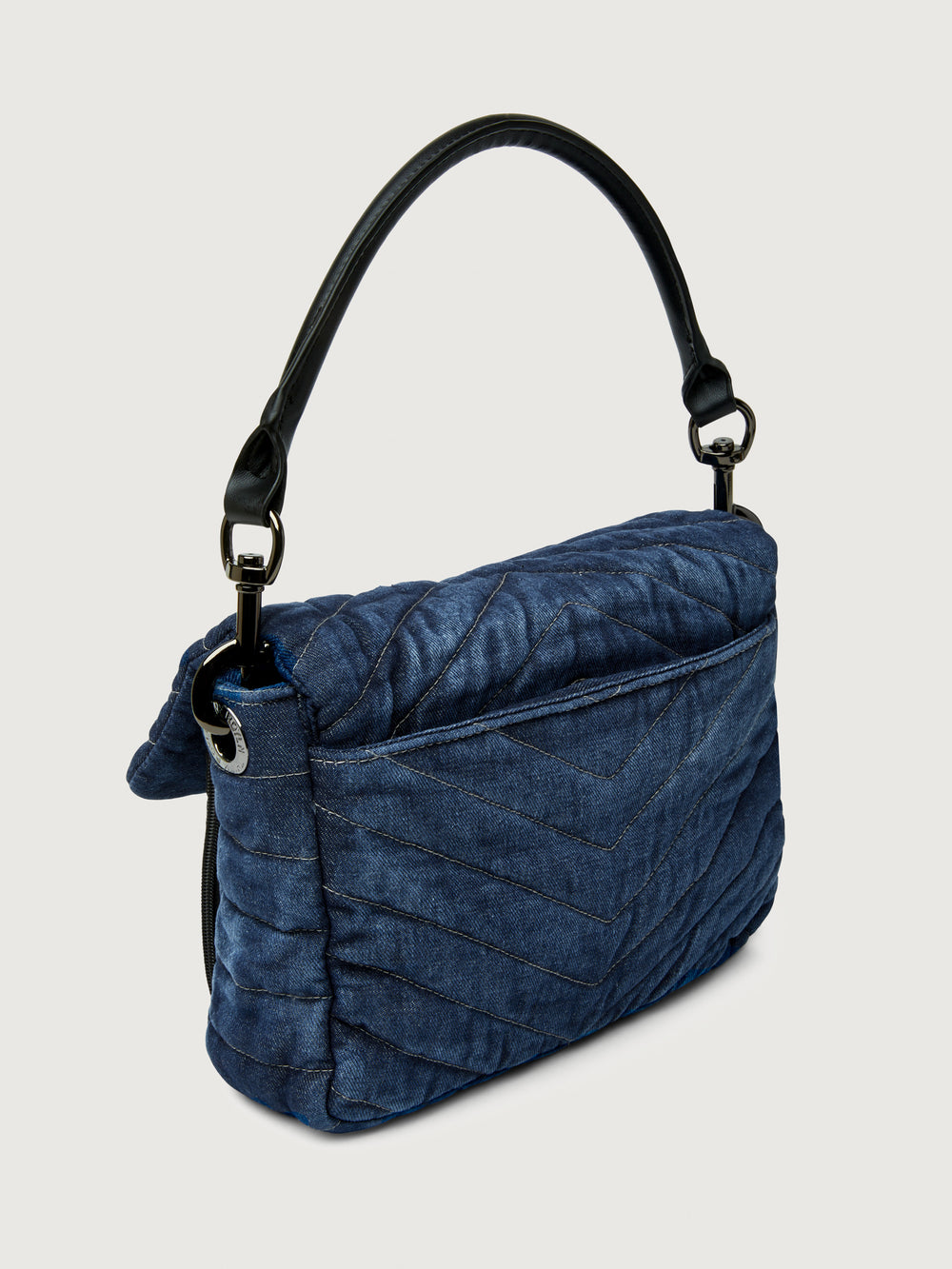 The Muse in Stone Washed Denim, angled back view with luxe hard handle.