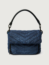 The Muse in Stone Washed Denim, front view with luxe hard handle.