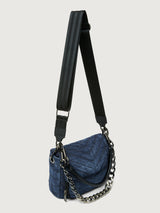 The Muse in Stone Washed Denim, angled view with chain handle and crossbody strap.