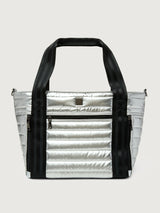 Silver insulated tote bag with black handles on a light gray background