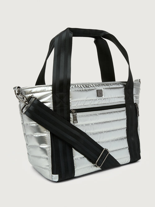Silver insulated tote bag with black handles on a light gray background