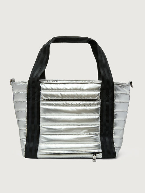 Silver insulated tote bag with black handles on a light gray background