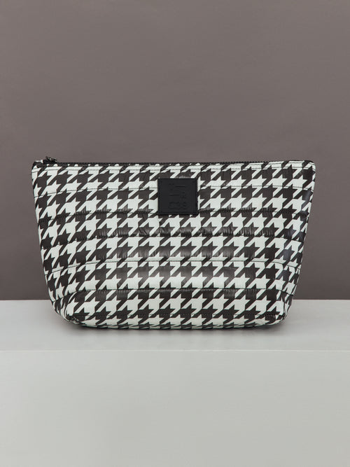 Front close-up of Travel Trio Large Bag in Houndstooth print with logo patch detail.
