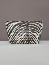 Back view of zebra-print quilted pouch from the Travel Trio set.