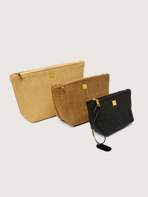 Travel Trio in Dune Raffia, angled group view with rubber loop detail.