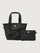 Front view of Think Royln Capri tote bag in black with matching detachable pouch and adjustable shoulder strap.