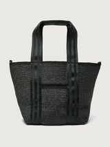 Back view of Think Royln Capri black woven tote highlighting striped handles.