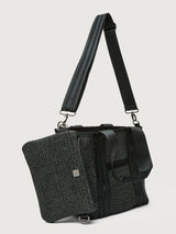 Side angle of Think Royln Capri tote with detachable black pouch clipped to bag.