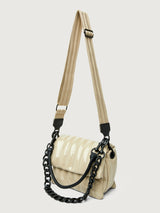 Beige handbag with black handle on a light gray background
