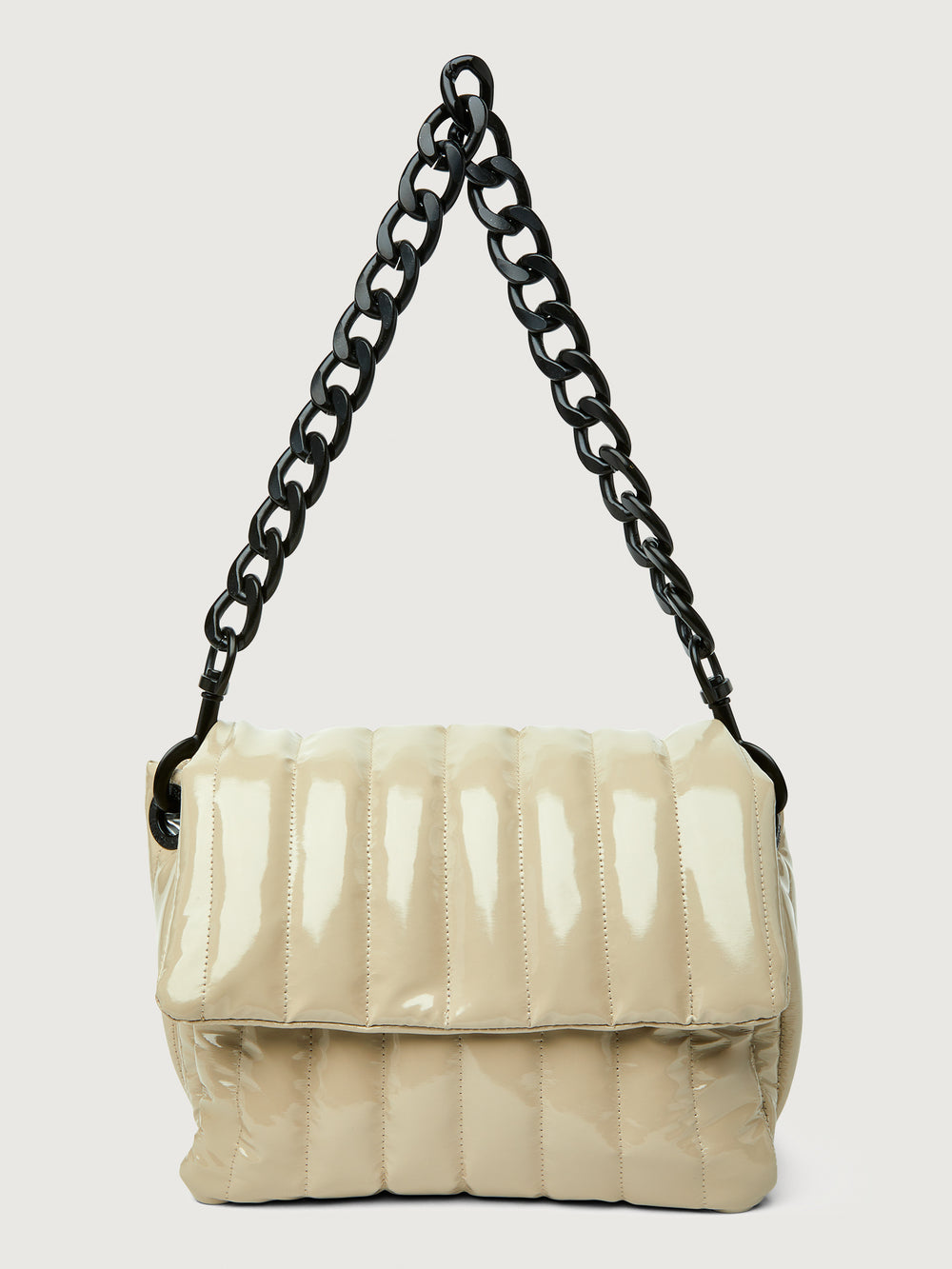 Beige handbag with black handle on a light gray background