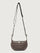 Brown shoulder bag with a strap on a light gray background