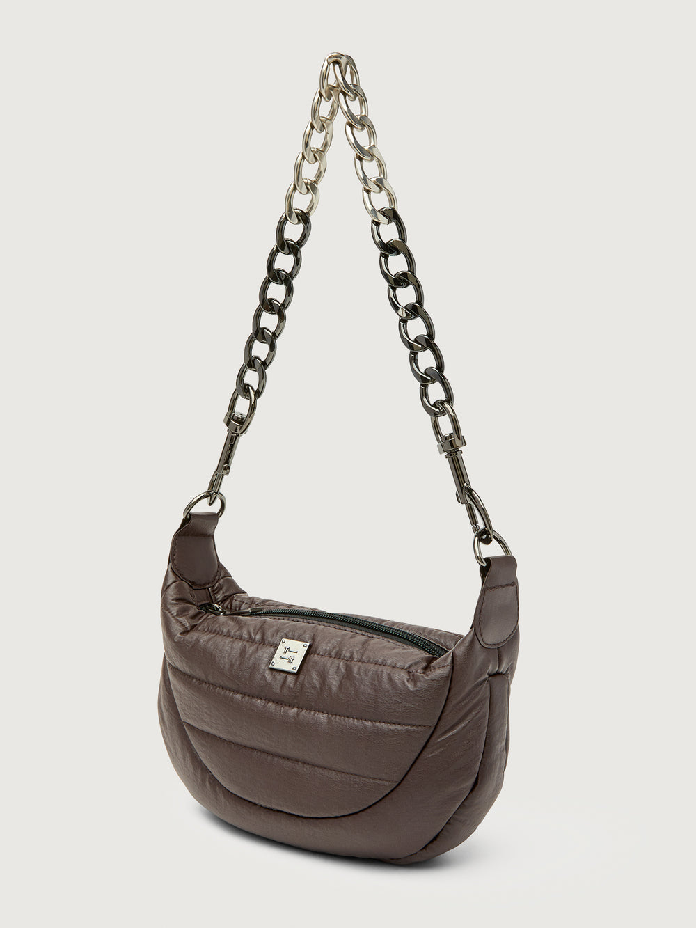 Brown handbag with chain strap on a light gray background