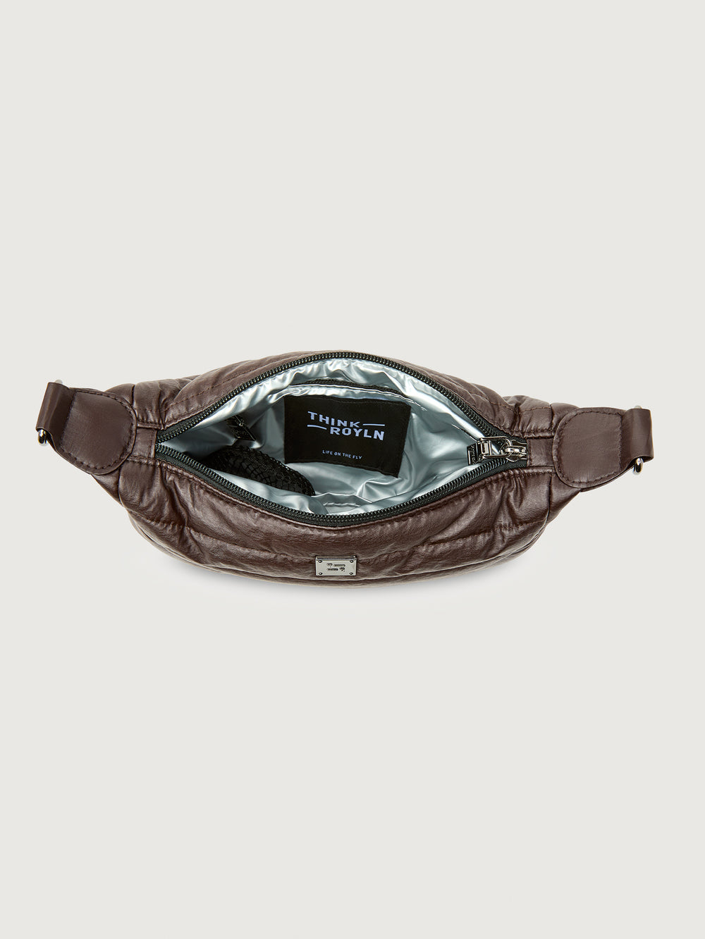 Brown waist bag with 'Triumph' branding on a light gray background