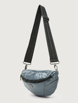 Carbon waist bag with a black strap on a light gray background