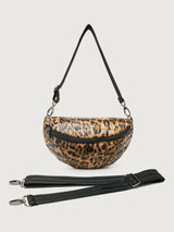 Leopard print crossbody bag with a black strap on a light gray background