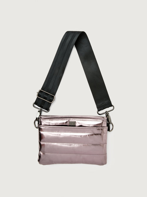 Misty metallic mirror bag with a black crossbody strap and a silver buckle.