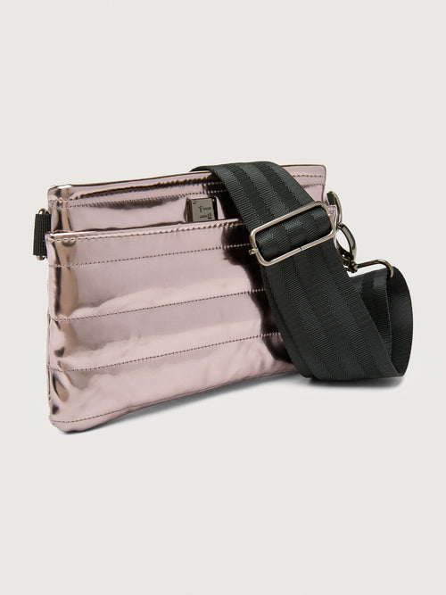 Misty metallic mirror bag with a black crossbody strap and a silver buckle.
