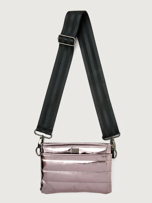 Misty metallic mirror bag with a black crossbody strap and a silver buckle.