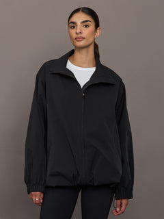 Model is wearing the Corben Jacket in black, front view.