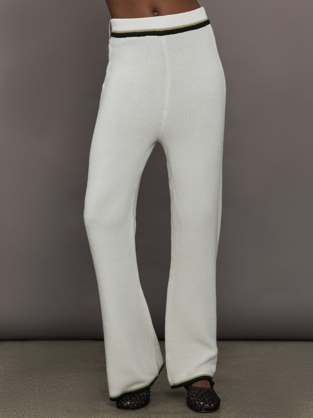 Model is wearing the Soraya Knit Full-Length Pant Sea Salt, front view.