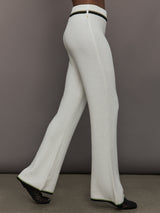 Model is wearing the Soraya Knit Full-Length Pant Sea Salt, side walking view.