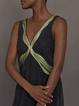 Close up of the Onyx embroidered cupro maxi dress, bodice detail.