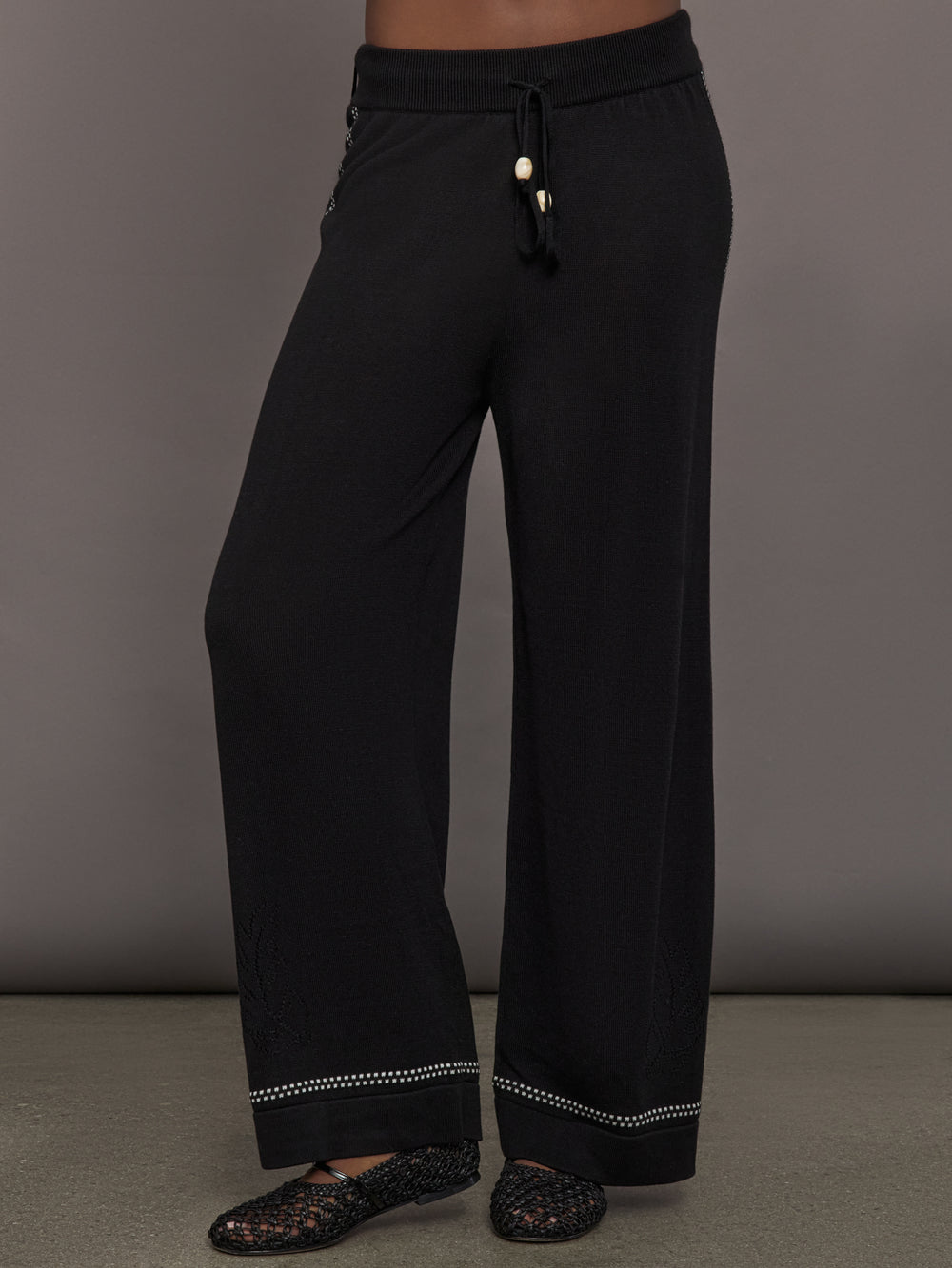 Model is wearing the Lawrence Knit Pant Ink, front view.