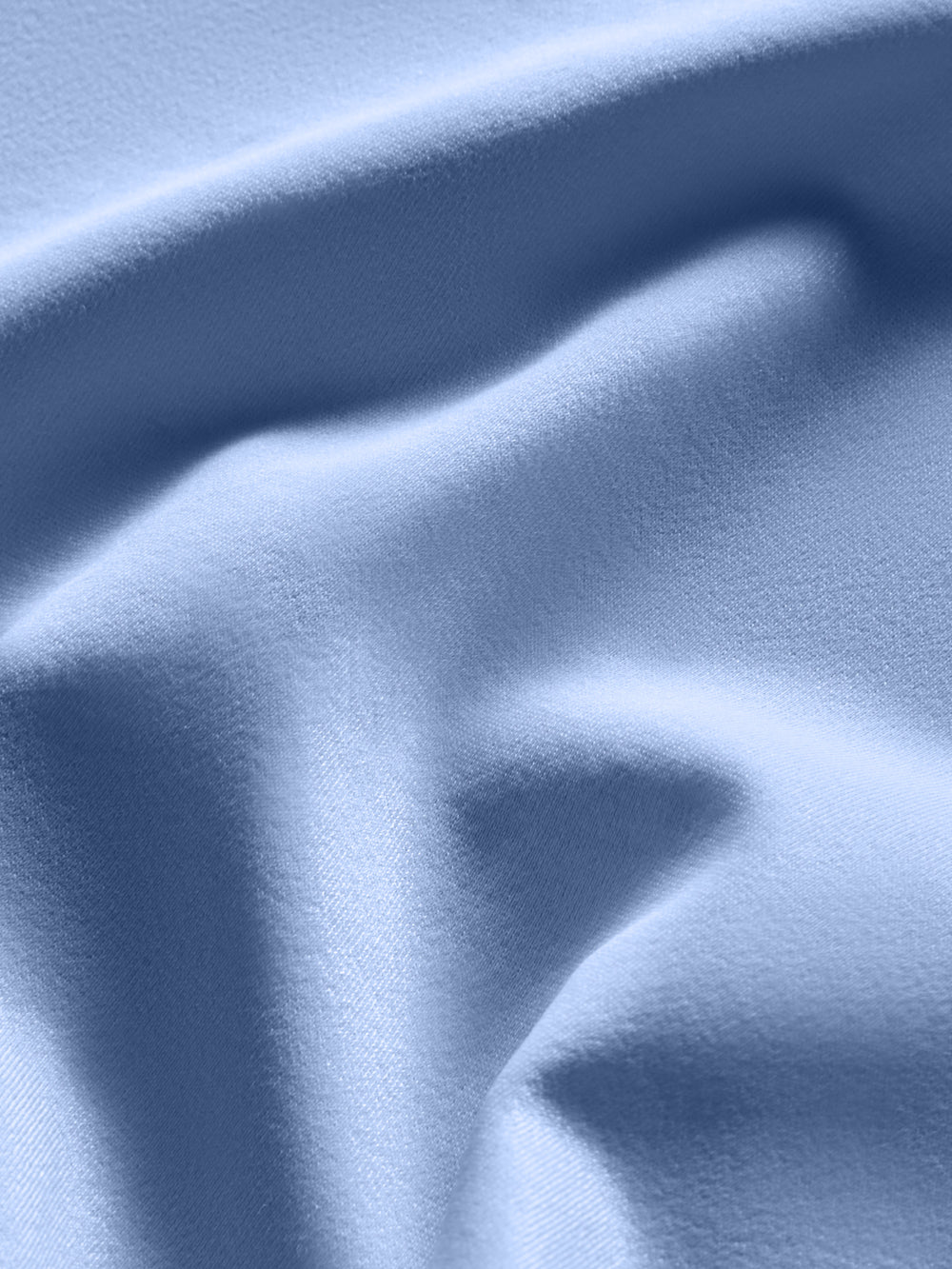 Close up of Takara Shine fabric in Serenity showing smooth performance finish.