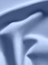 Close up of Takara Shine fabric in Serenity showing smooth performance finish.