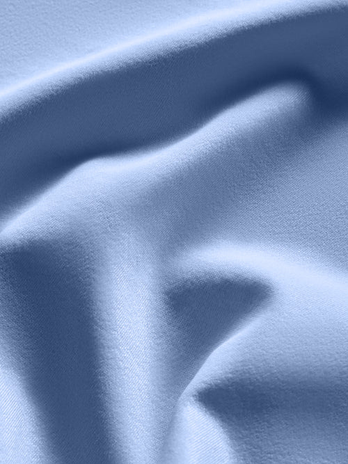 Close up of Takara Shine fabric in Serenity showing smooth performance finish.