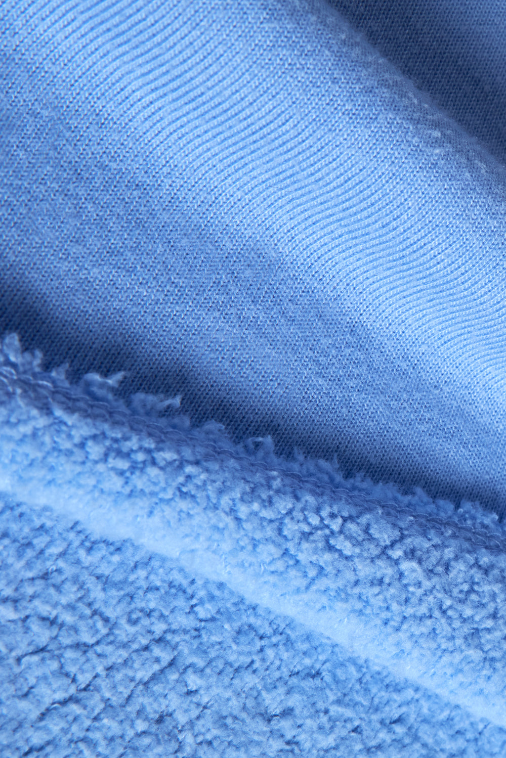 Close up of the French Terry fabric in Serenity showing soft looped interior texture.