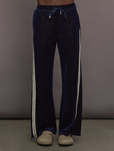 Model is wearing Velour High-Waisted Wide-Leg Pant in Polka Dot, front view.